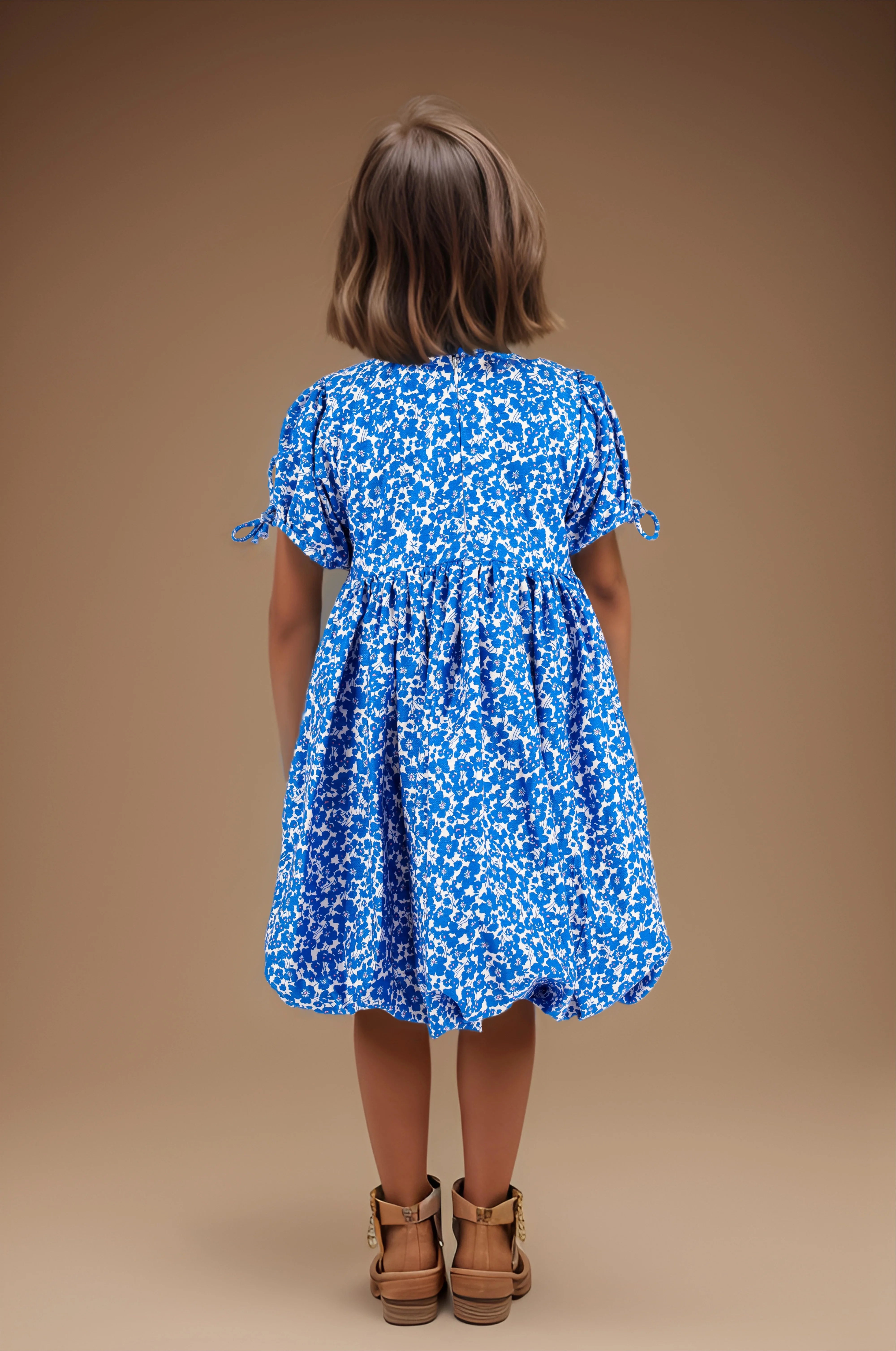 Full back of a Floral Print Pure Cotton Dress For Girls.