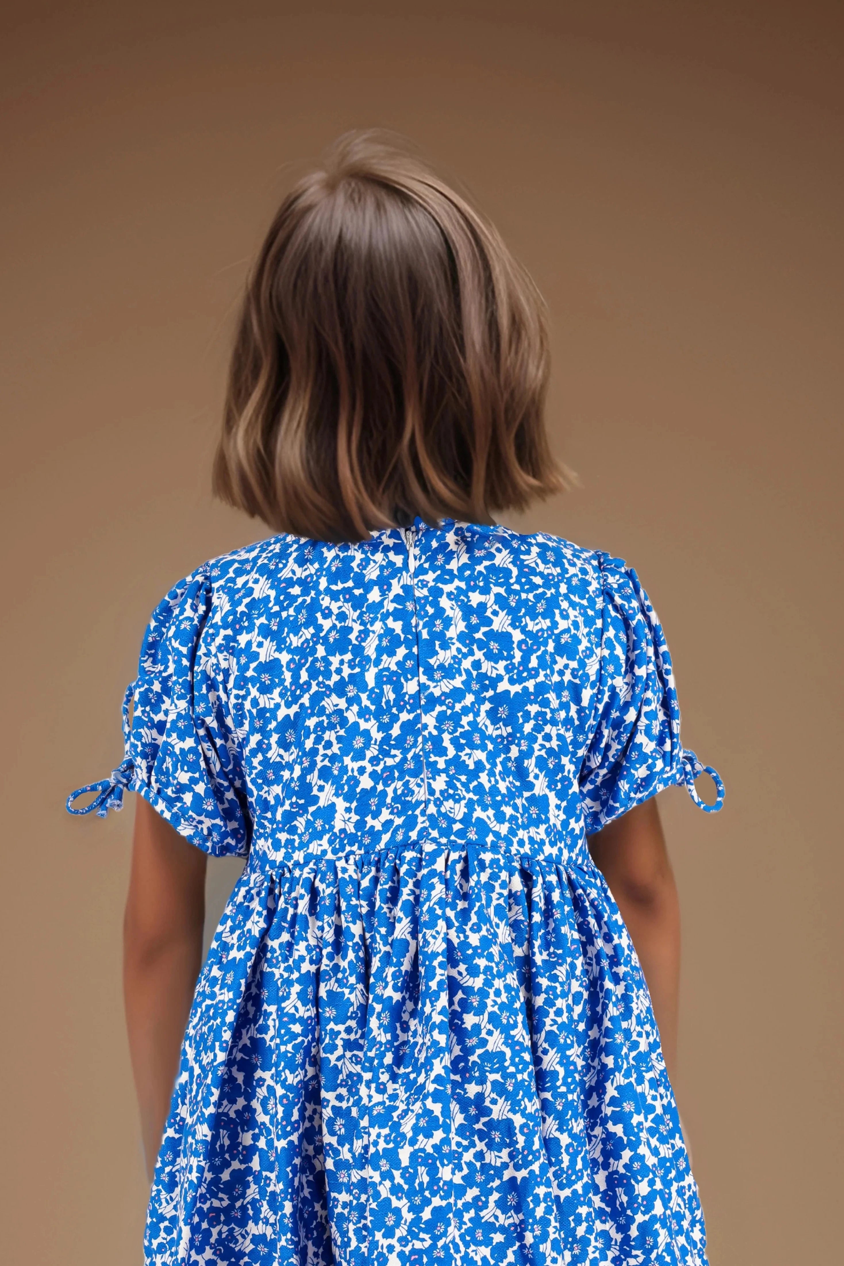 Back close up view of a Floral Print Pure Cotton Dress For Girls.