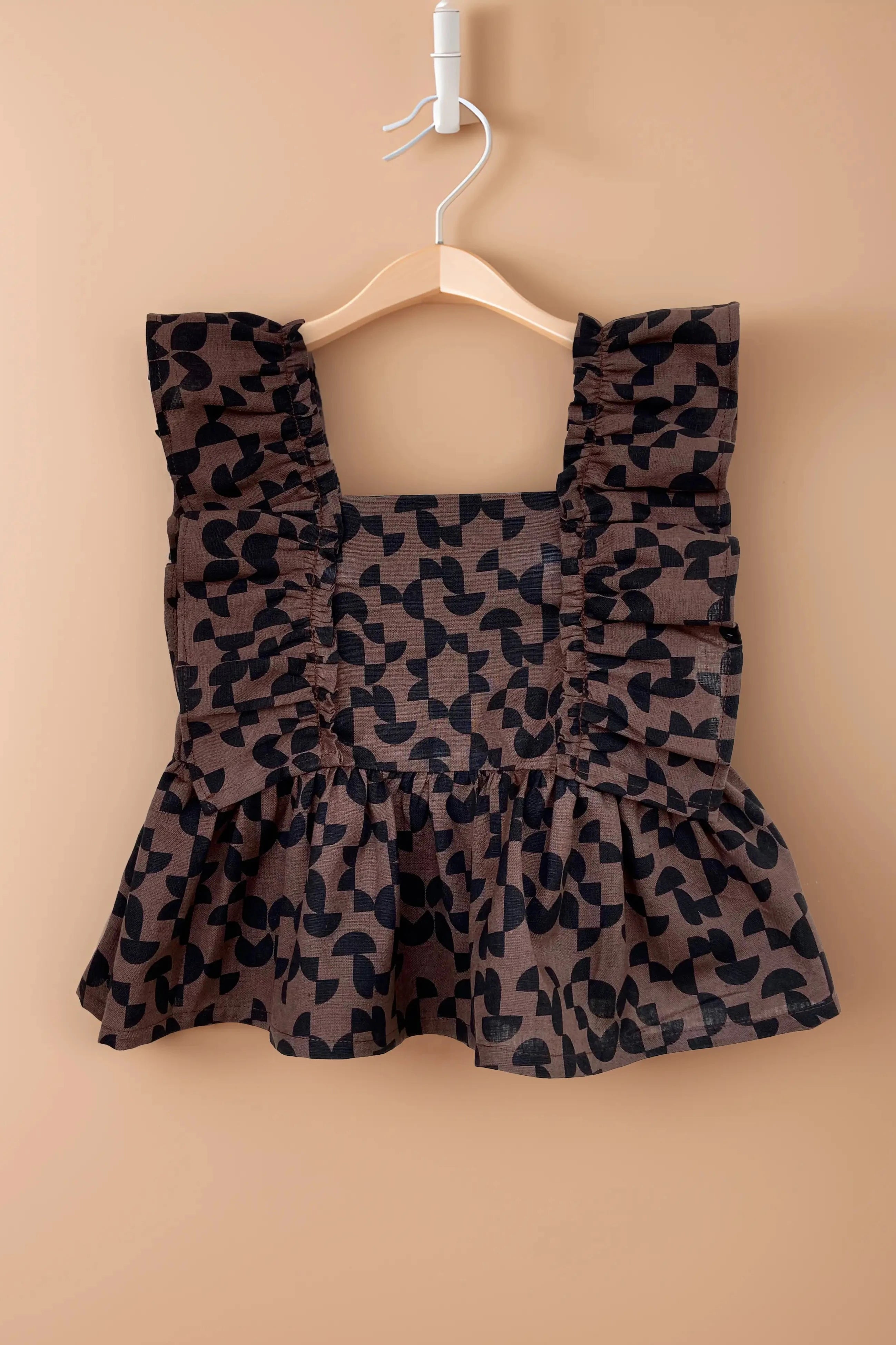 Flat view of top of a Girls' Brown Cotton Top and Pants Set.