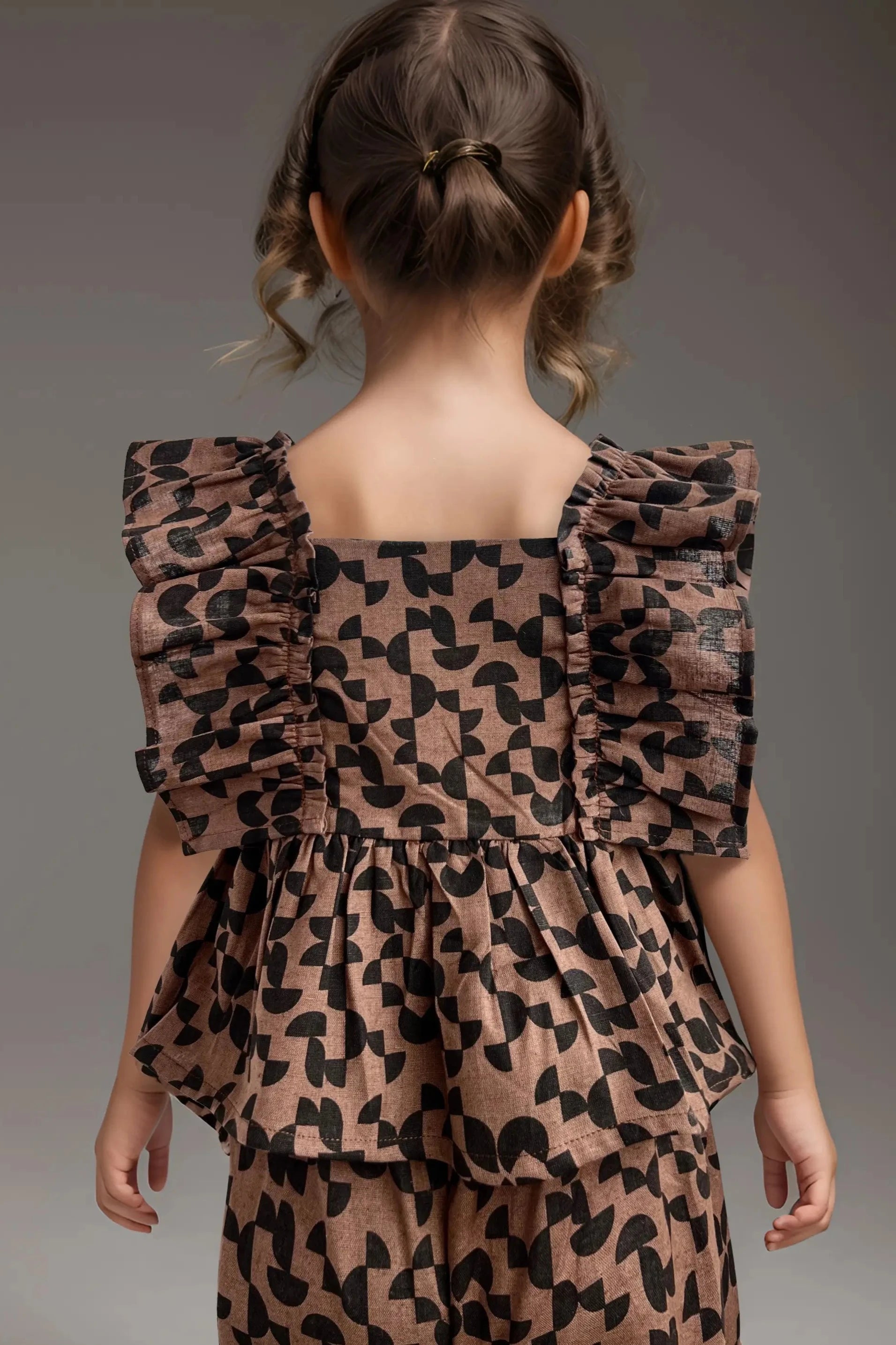 Back close up of a Girls' Brown Cotton Top and Pants Set.