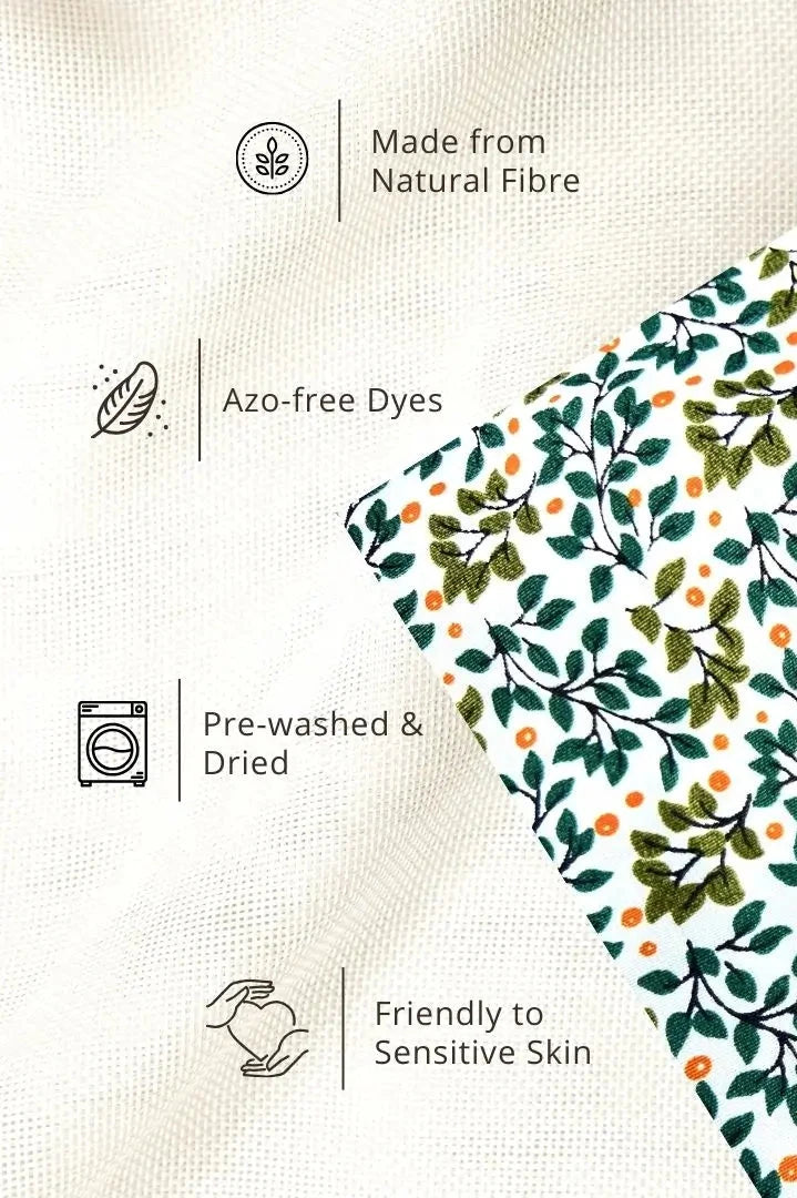 Fabric detail of a green dress for baby girl, designed for kids aged 2 to 9 years old.