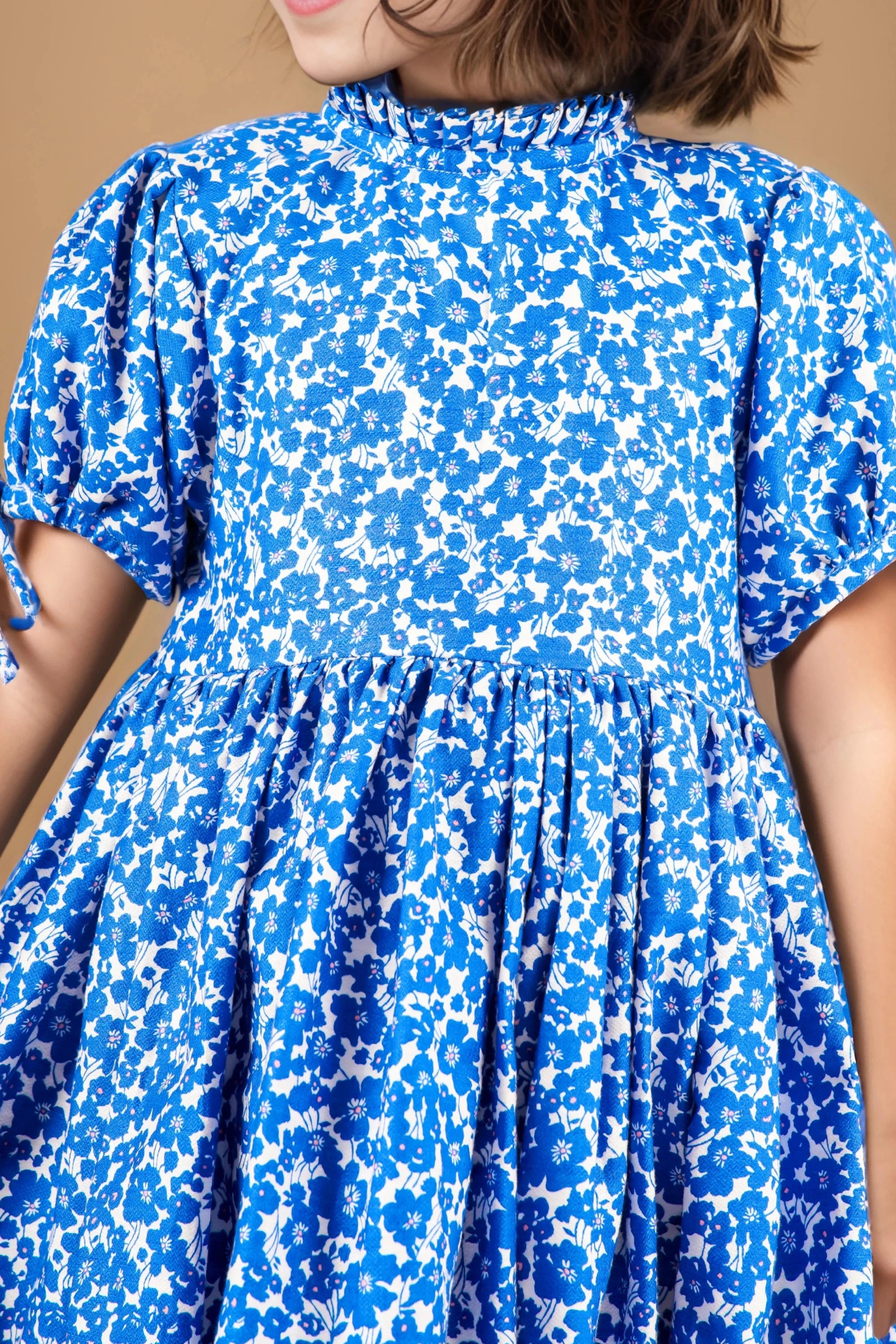 Front close up view of a Floral Print Pure Cotton Dress For Girls.