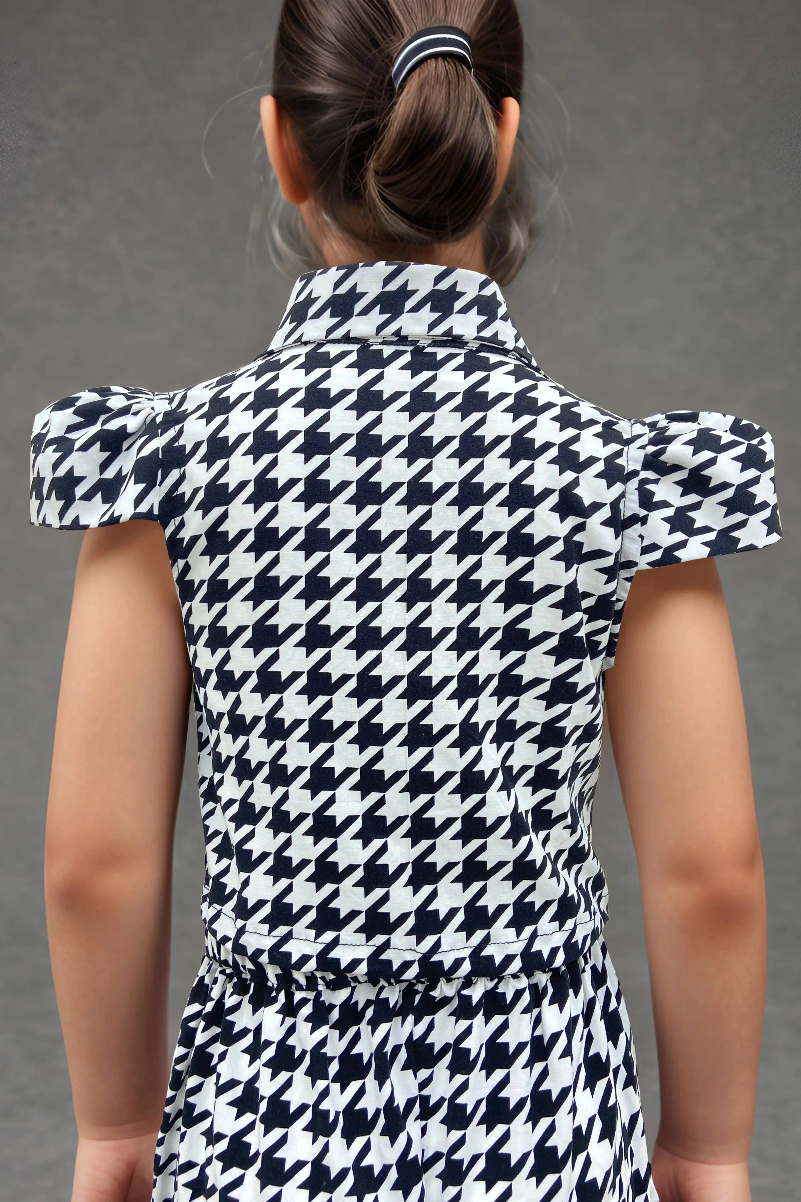 Back close up view of trendy houndstooth co-ord set for girls.