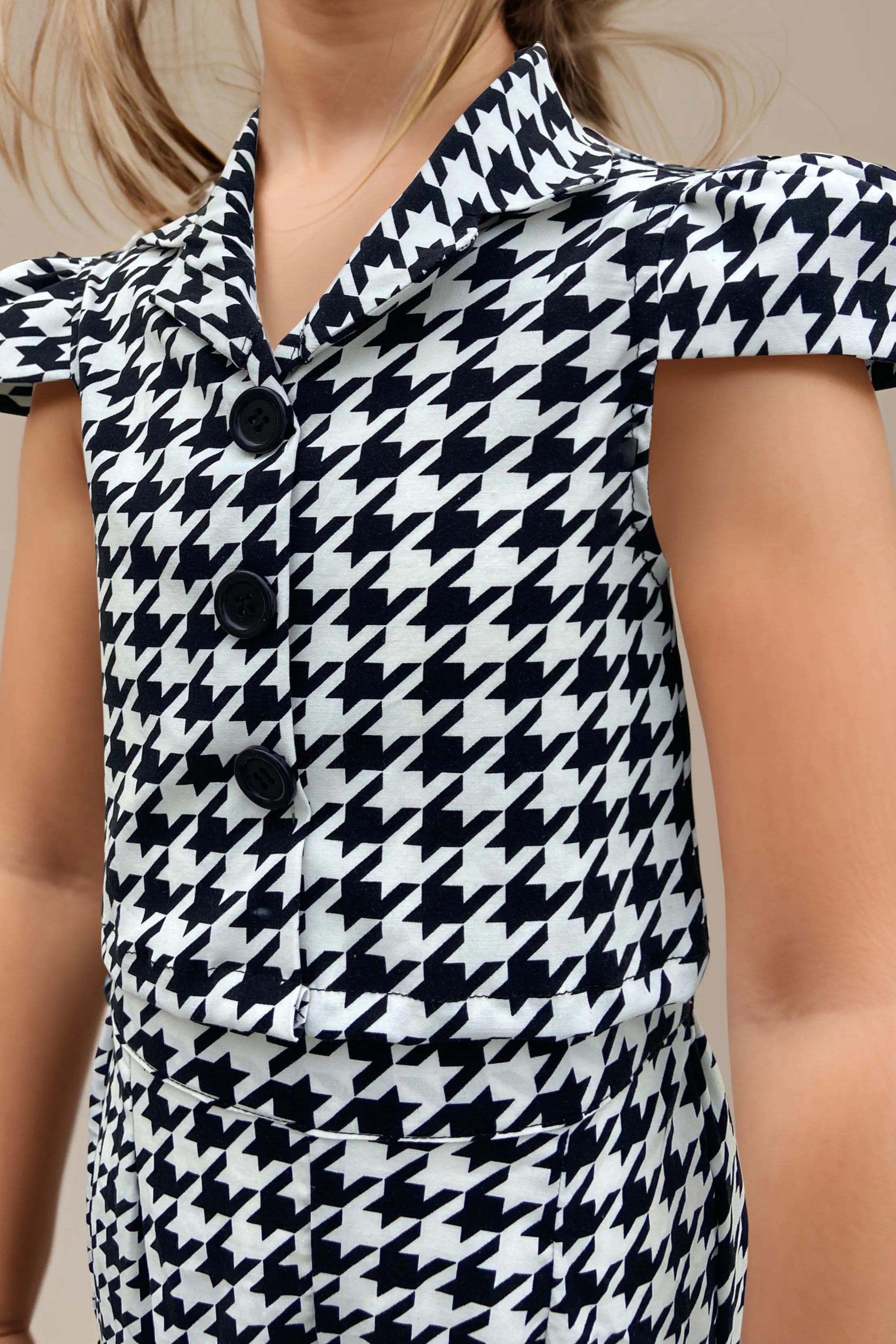 Front side view of trendy houndstooth co-ord set for girls.