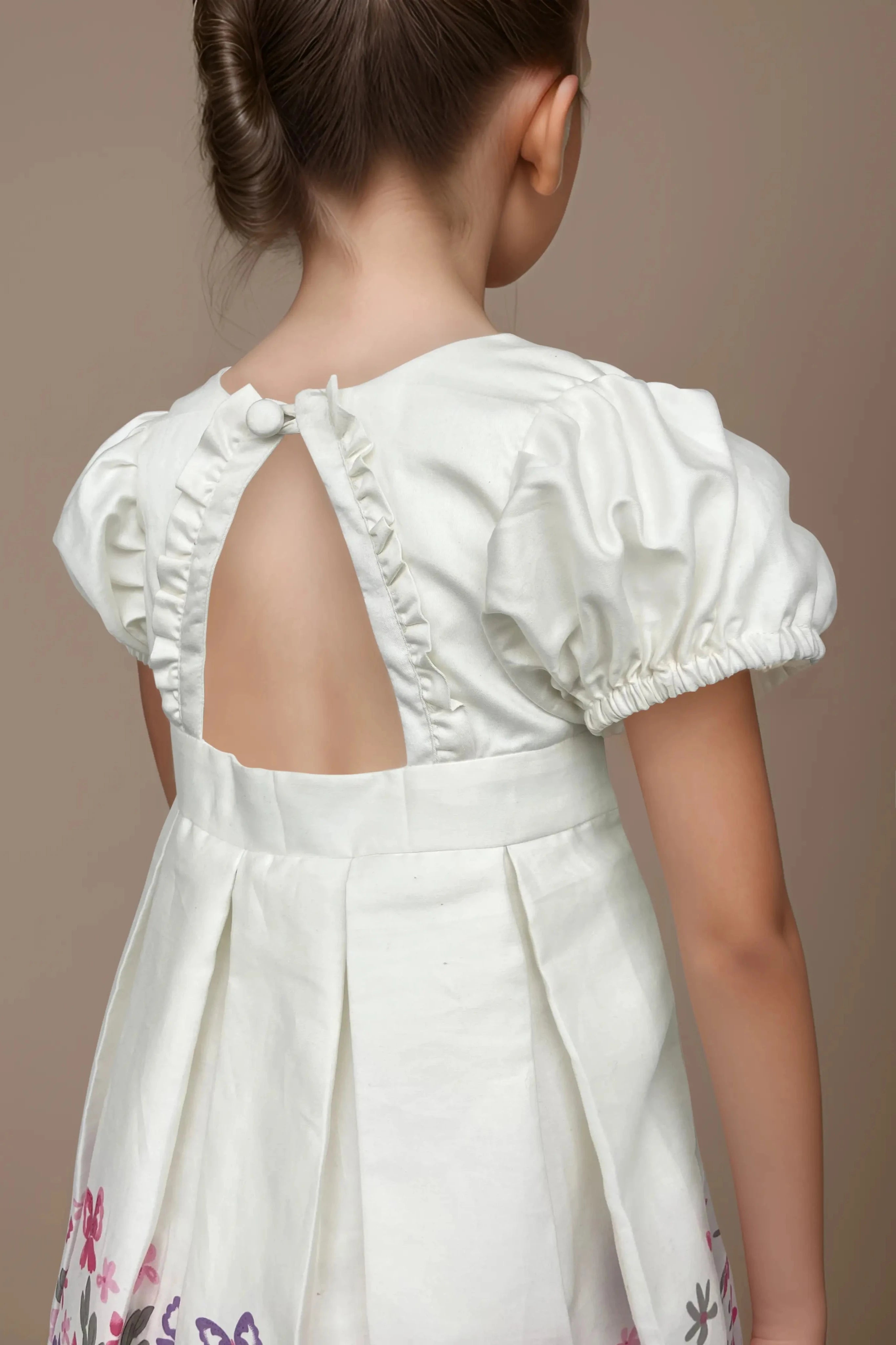 Back side view of a White Satin Floral Dress for Girls.