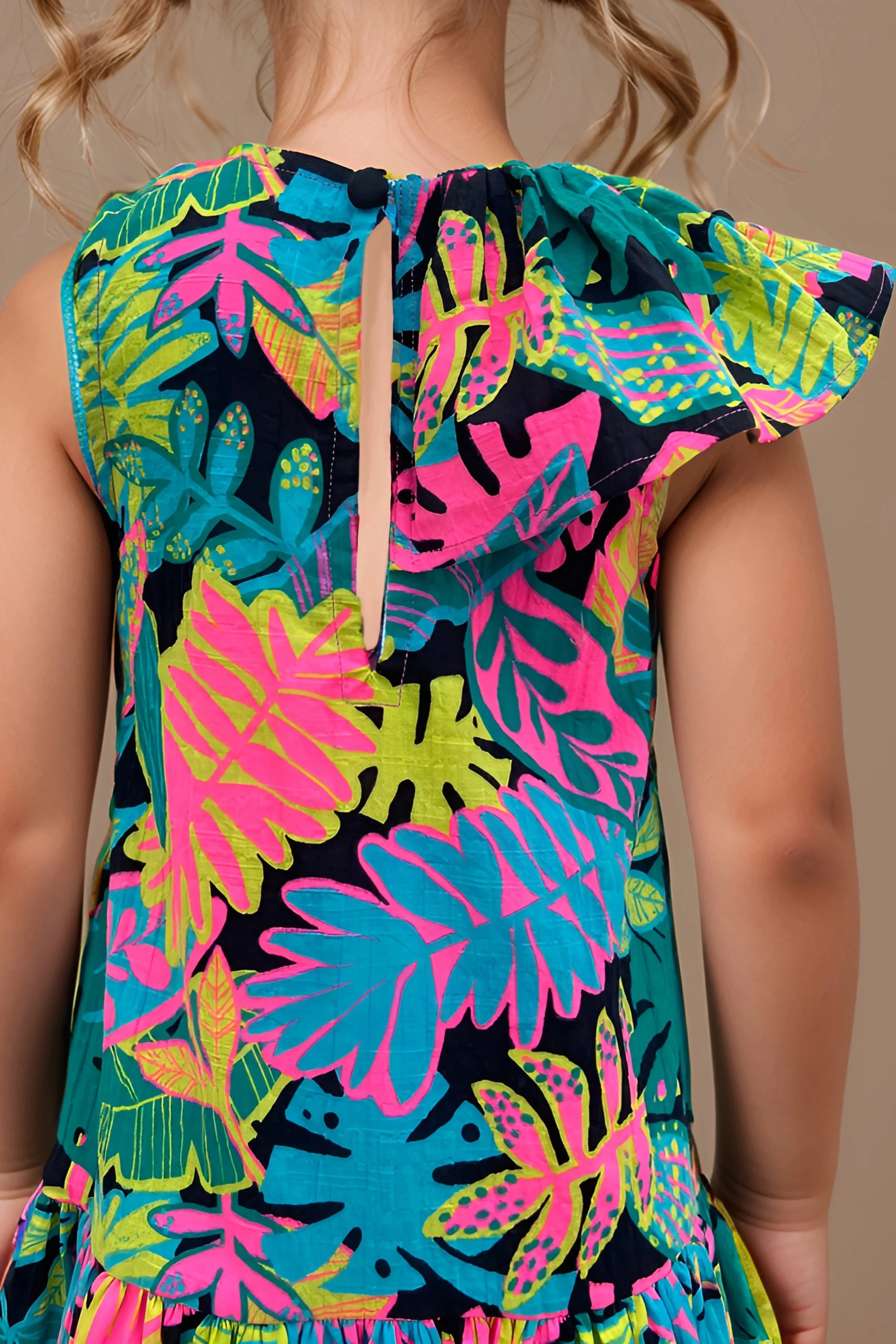 Back close up of a Stylish Girls' Tropical Print Cotton Dress.