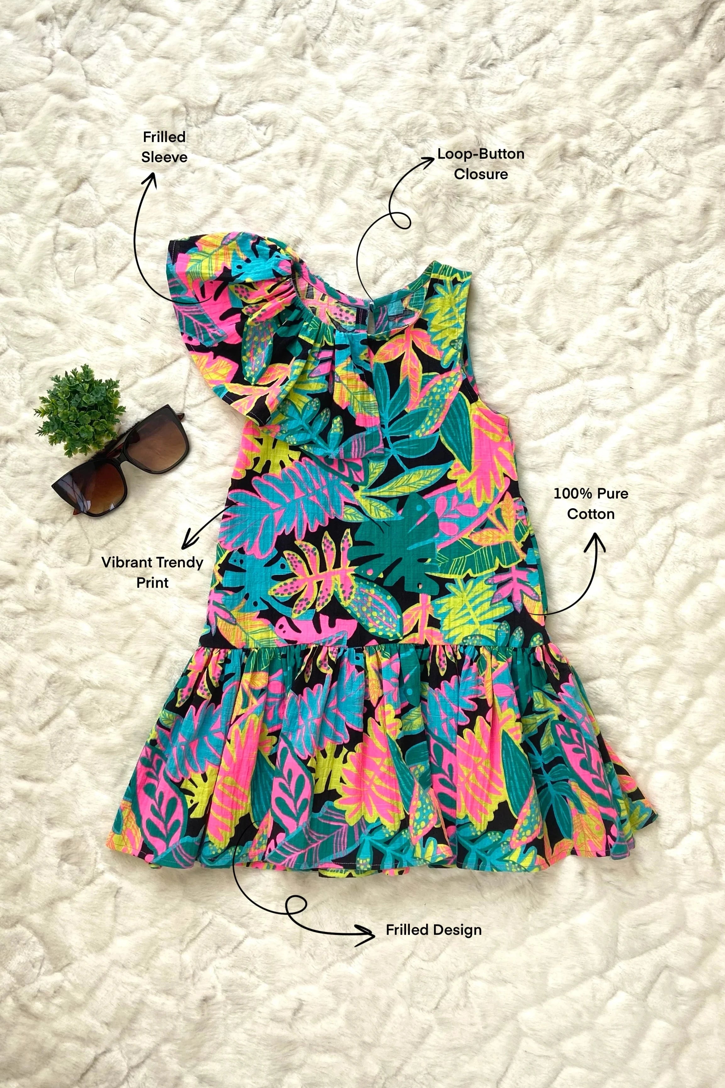 Flat view of a Stylish Girls' Tropical Print Cotton Dress.