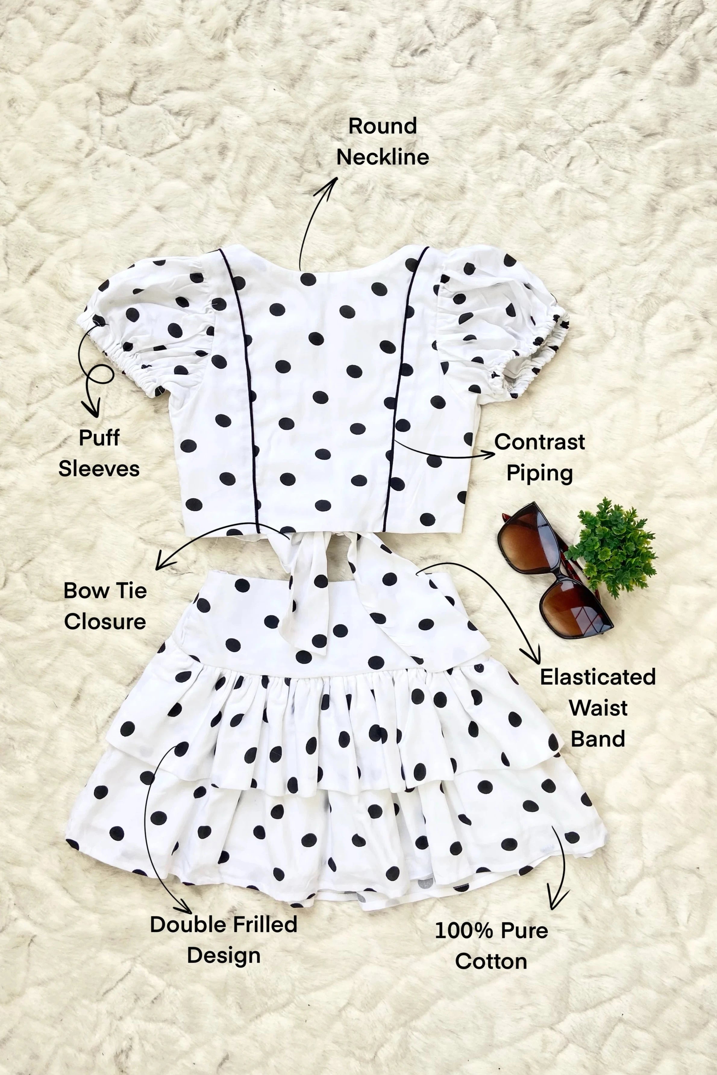 Flat view of a White Polka Dot Top and Skirt Set for Girls.